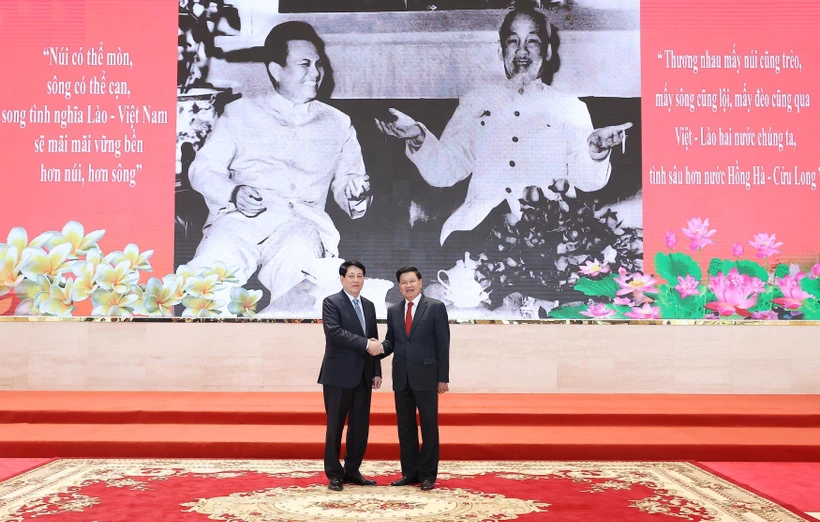 State President Luong Cuong attends Vietnam - Laos friendship exchange programme